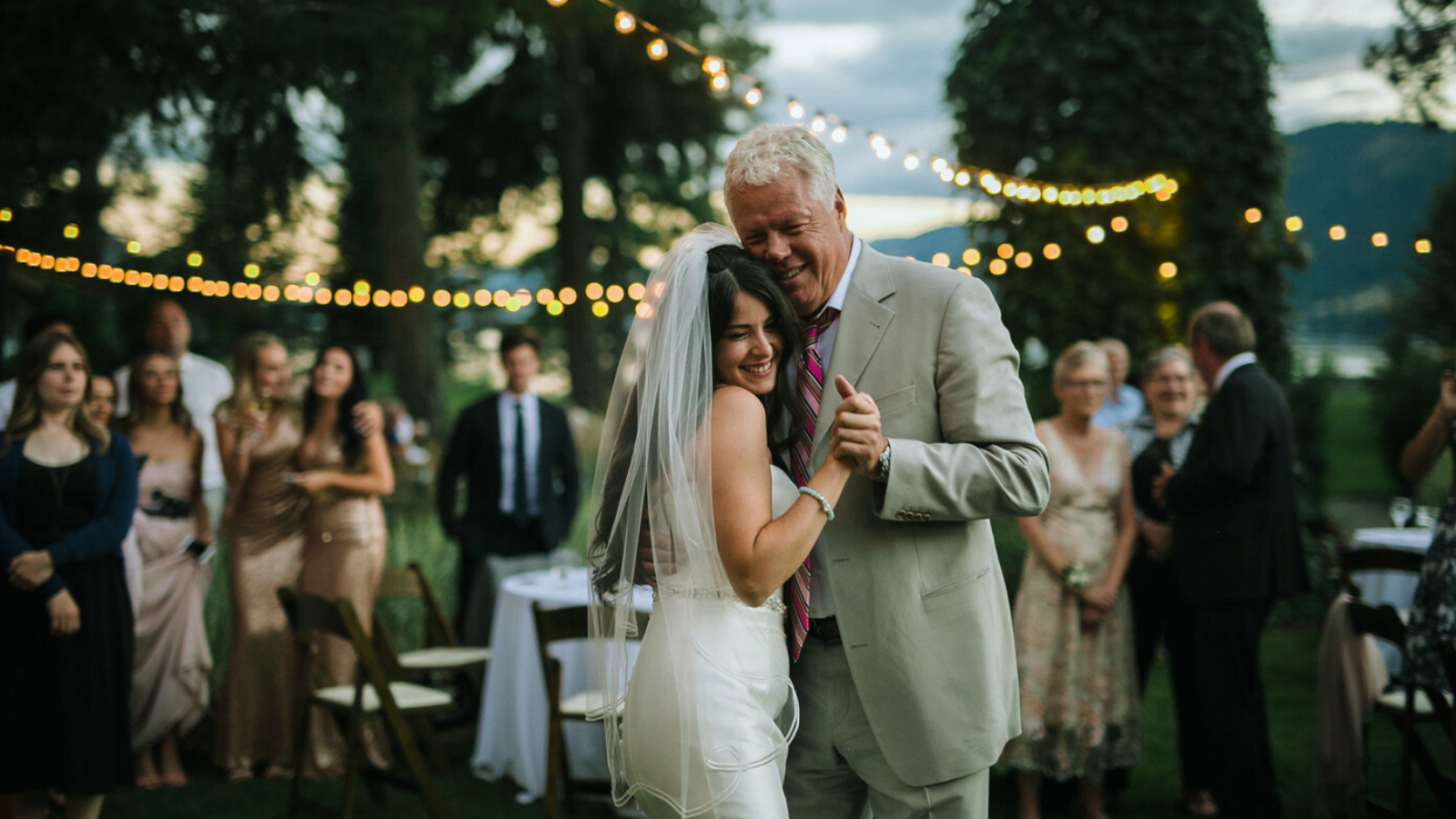 Father dancing with daughter at wedding