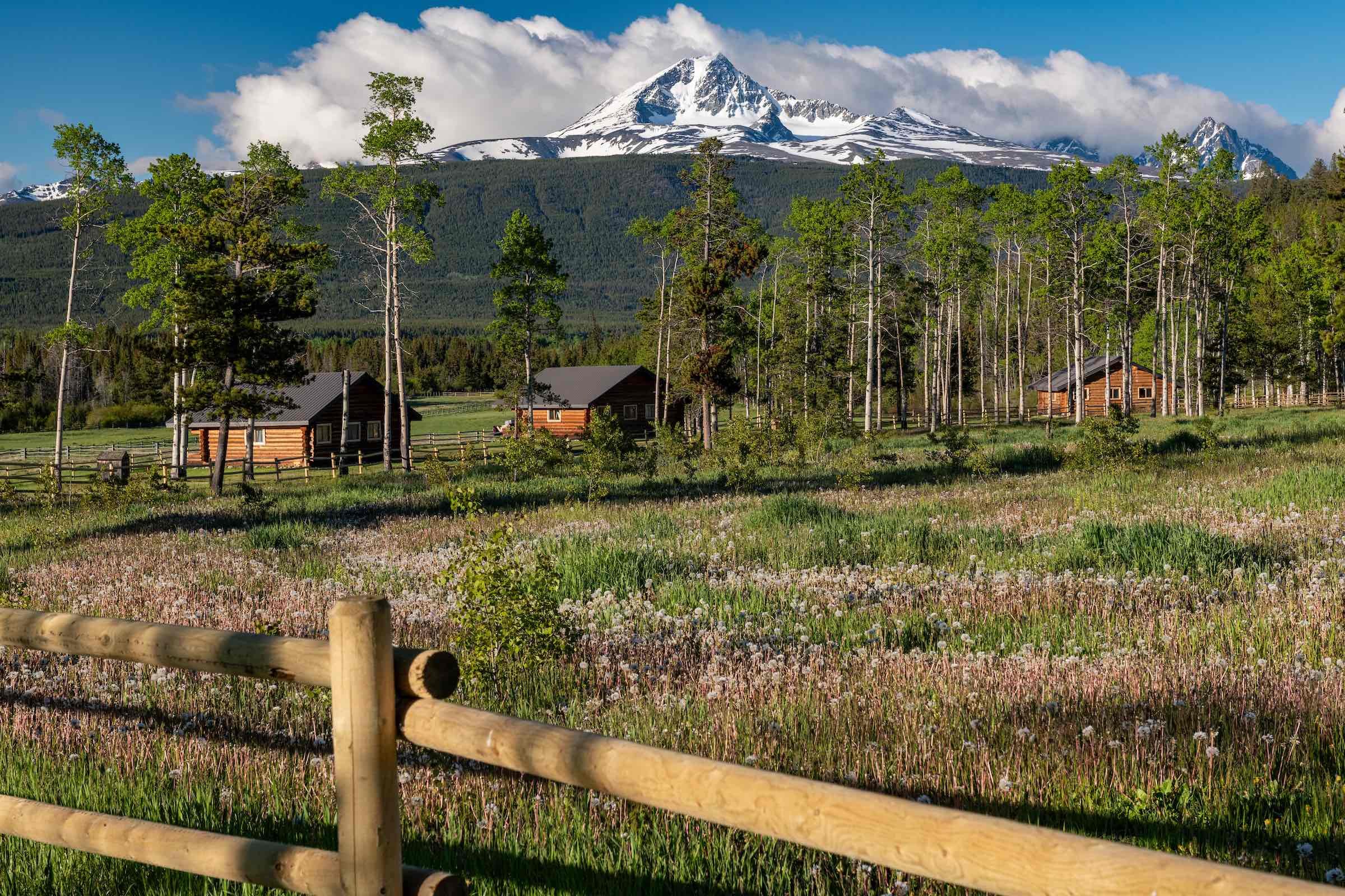 Field with mountain at Nemiah Valley Lodge