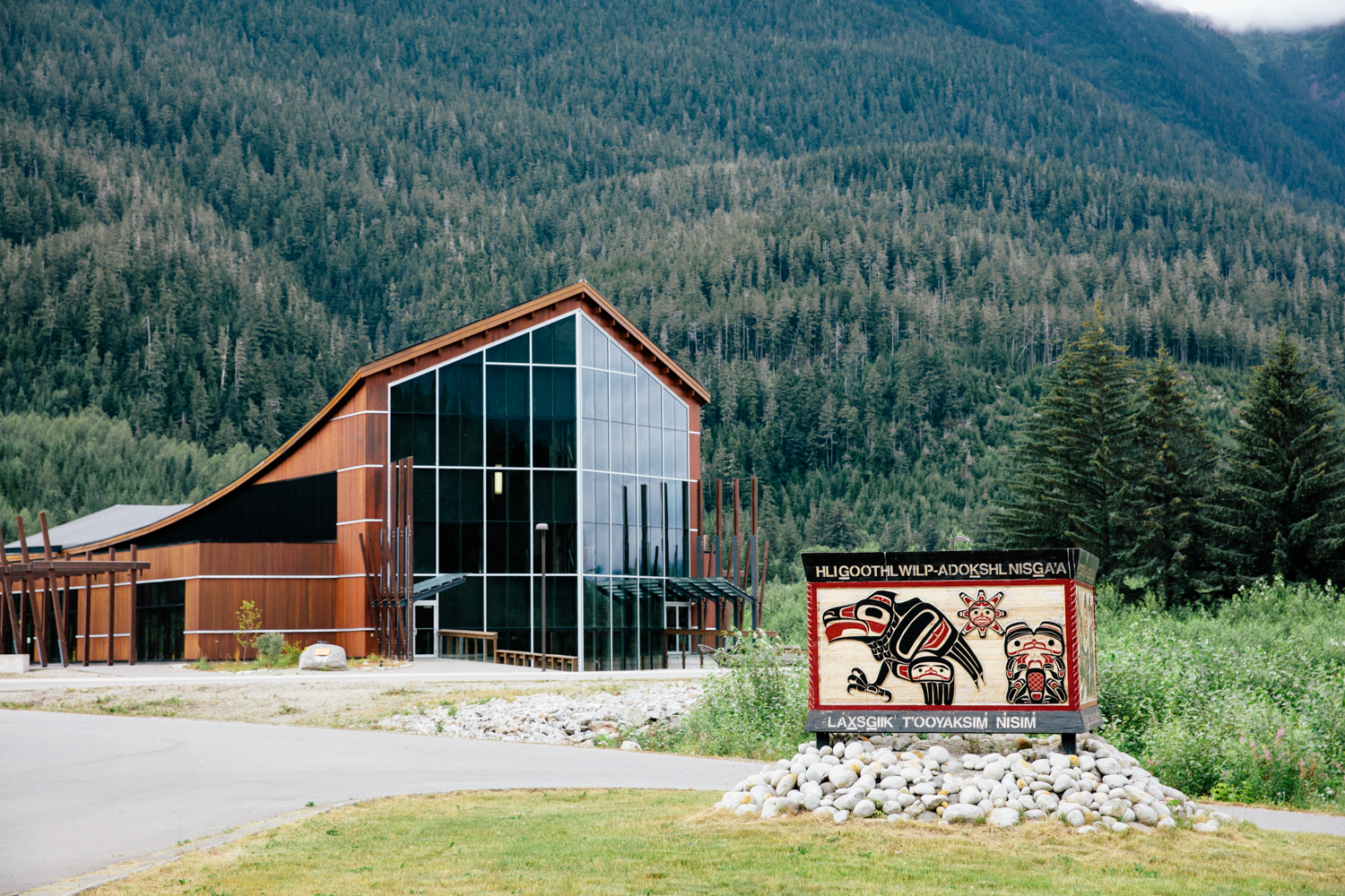 A building with 3 floors of glass windows in the rockies