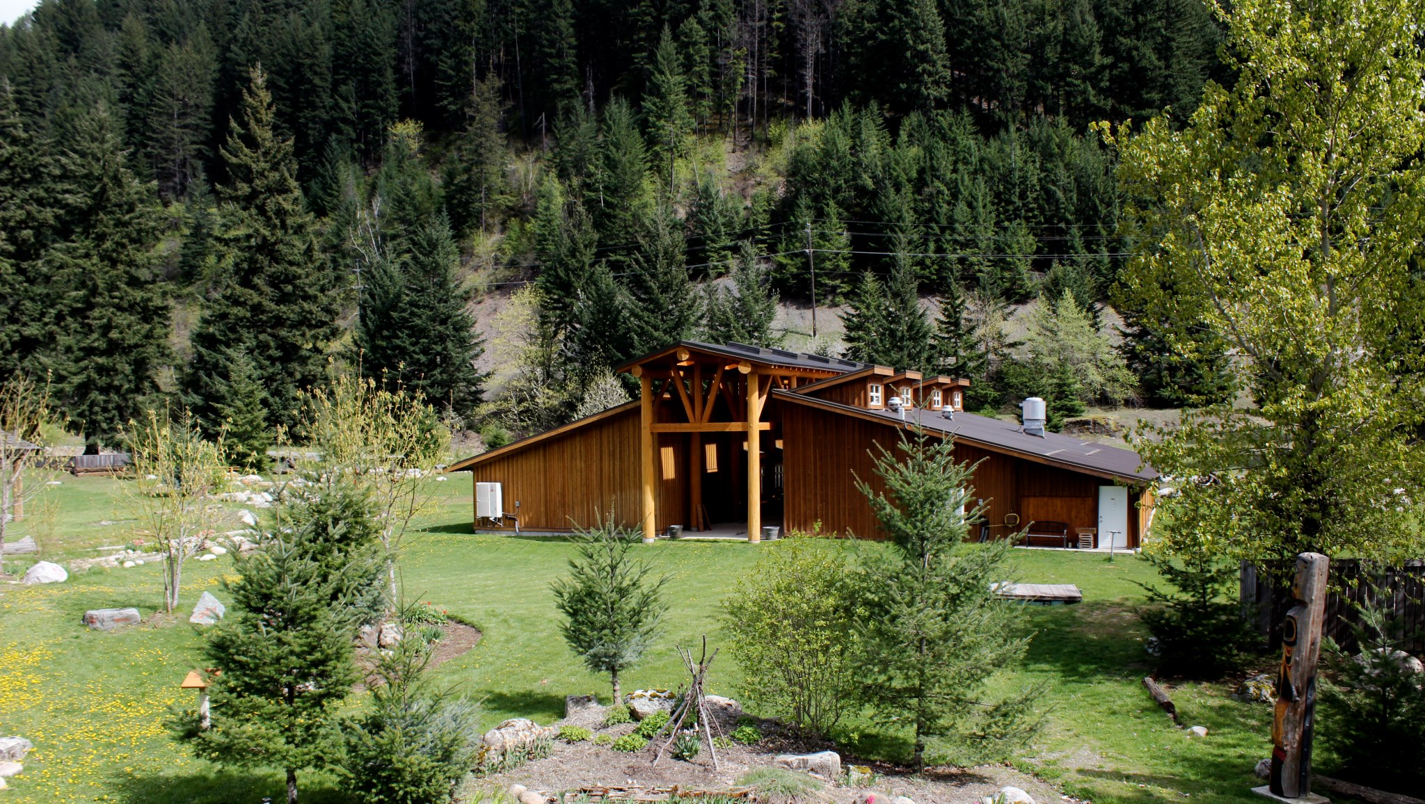 The view of the museum and giftshop from the top of the pit house of Tuckkwiowhum Village