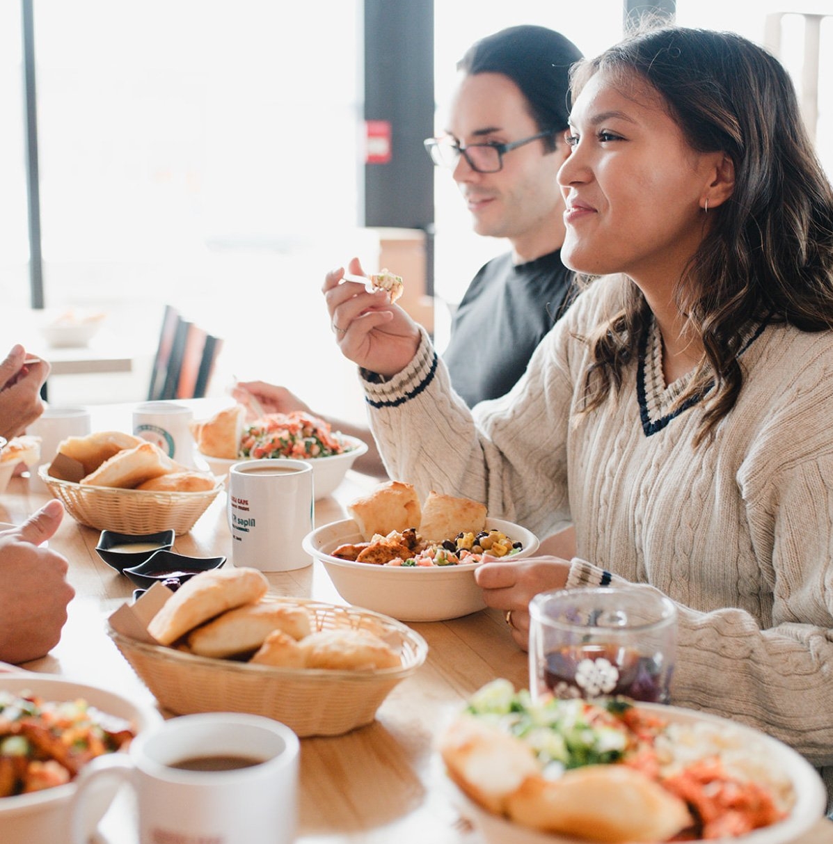 People eating and enjoying Kekuli Cafe