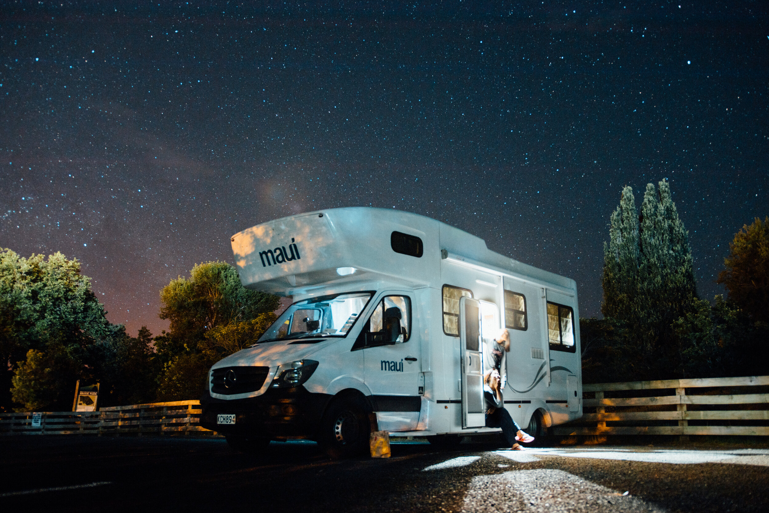 Camper RV under the stars at night