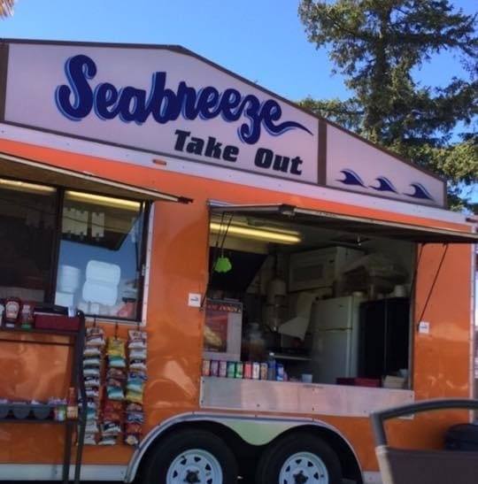 Seabreeze Take Out food truck parked with snacks and beverages on display