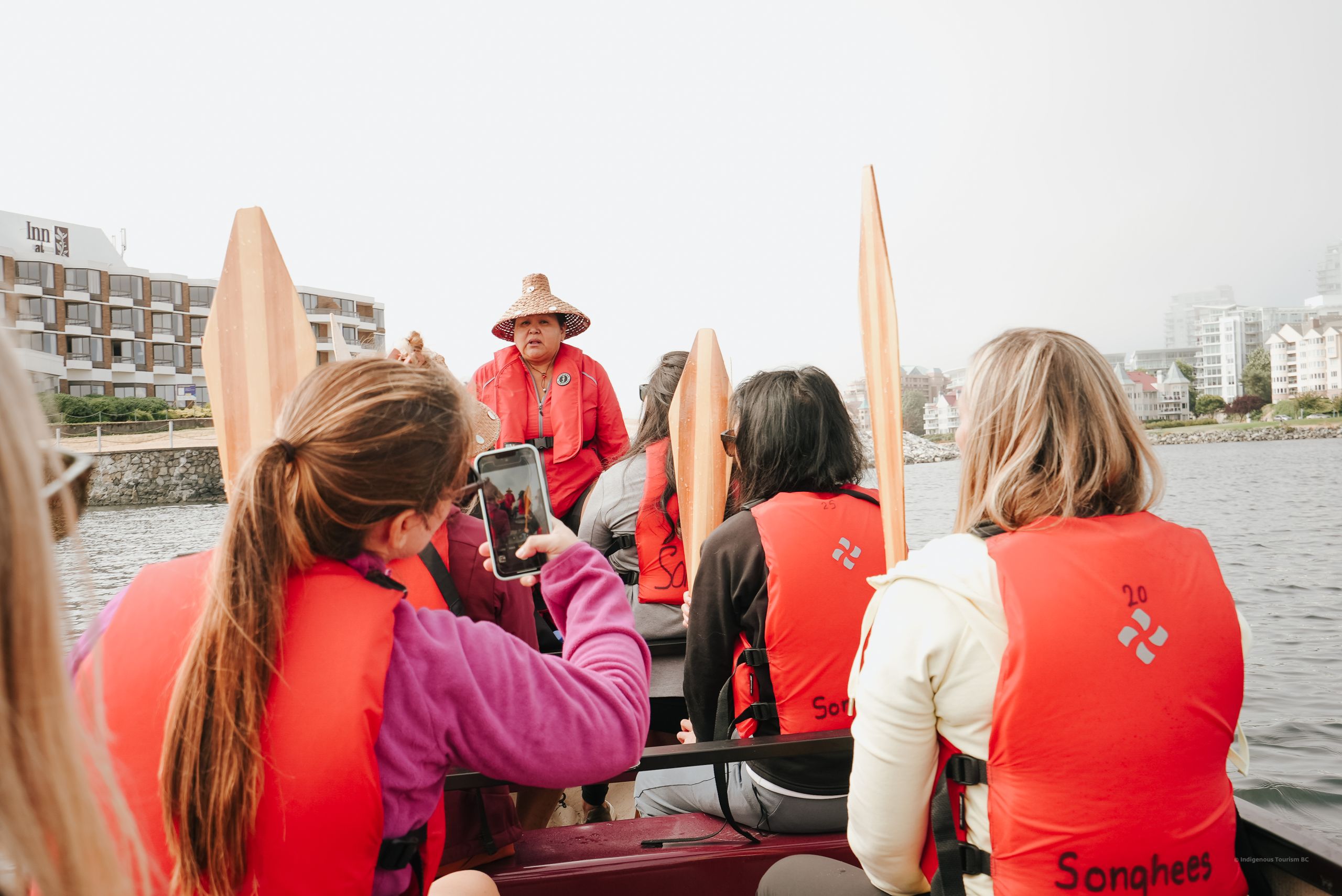 Tourists in a canoe for Songhee Tours