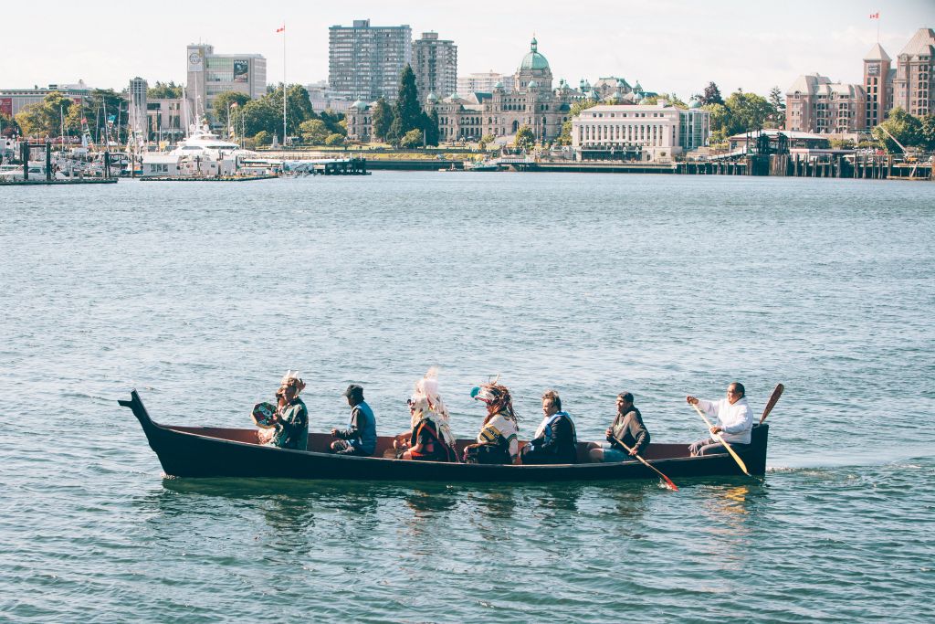 Indigenous people in a canoe