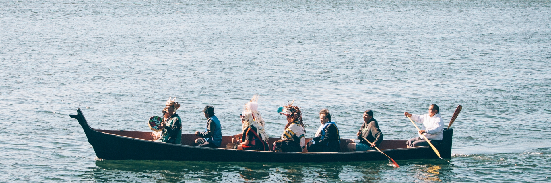 Indigenous people in a canoe