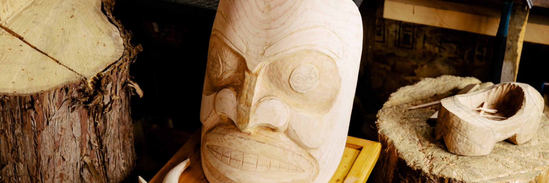 Beginnings of a mask being made from wood