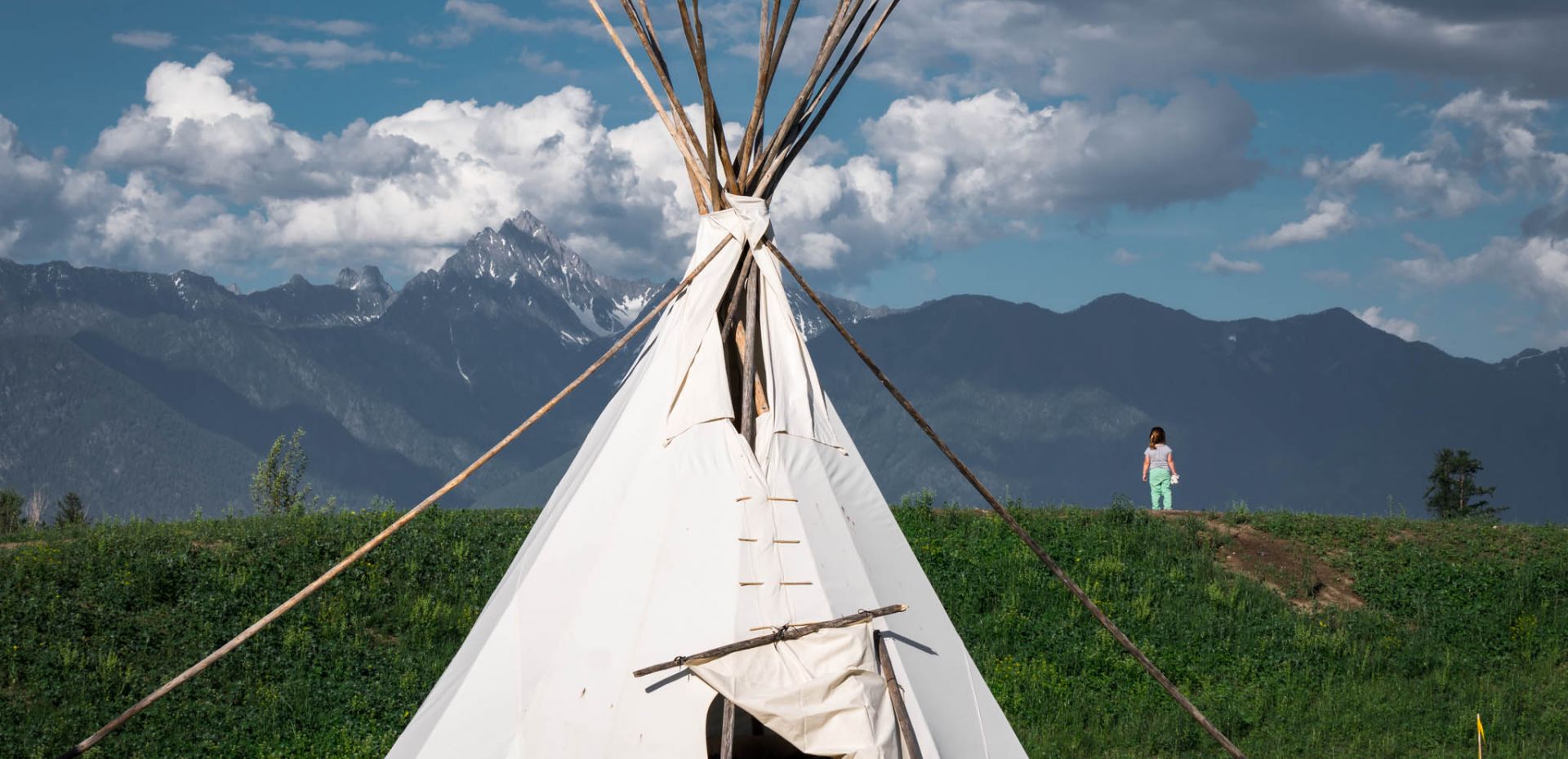 Teepee with mountains int eh background